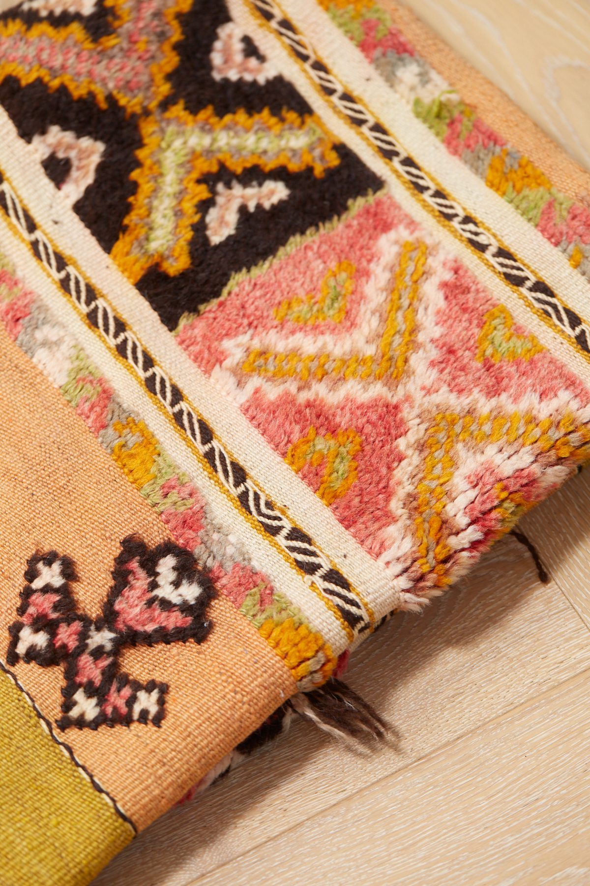 The Desert Rose pastel coloured Moroccan wool rug with geometric patterns.